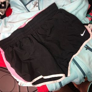 black and pink nike shorts